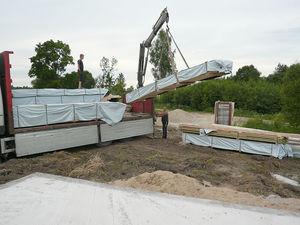 Pose du chalet en bois en kit